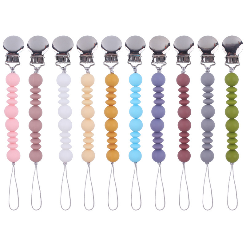 Nuevo bebé suministros chupete clip calmante bebé silicona espaciador perlas mordedura molar juguete anti-gota cadena