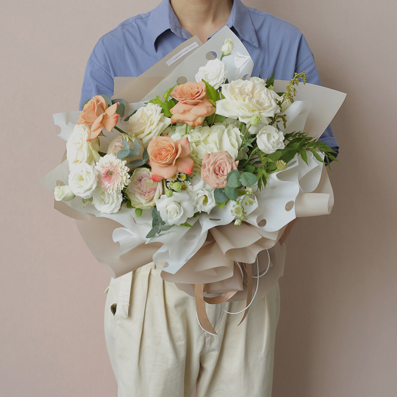 Papel elegante papel de regalo de flores monocromo engrosado papel de embalaje de ramo impermeable color sólido Ouya papel de regalo de flores al por mayor