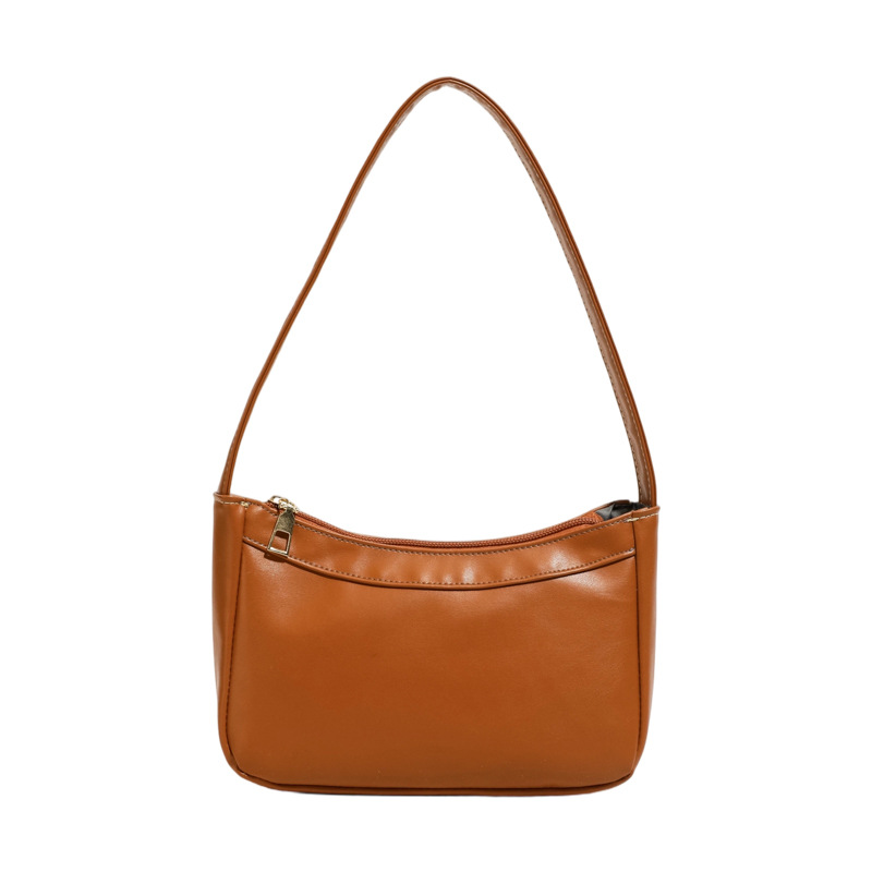 Bolsos de hombro coreanos para niños y niñas, bolsos de moda de color sólido, bolsos portátiles compactos y ligeros, 2026 nuevas bolsas para niños transfronterizas, bolsos de moda
