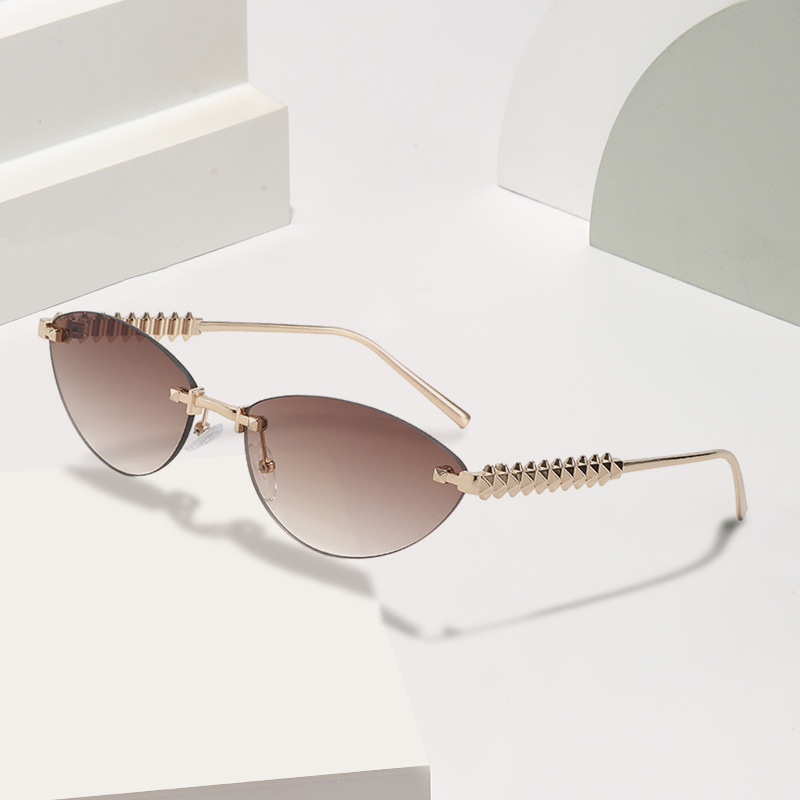 Metálico transfronterizo Europa y América de moda gafas de sol con ojos de gato, gafas de sol sin marco, gafas de sol personales