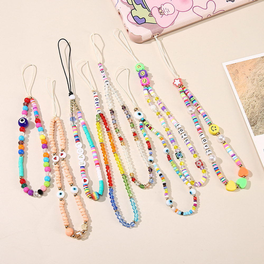 Cartoon Crystal Evil Eye Mobile Phone Lanyard Beads Letter Mobile Phone Chain Pendant Anti-fall display picture 1