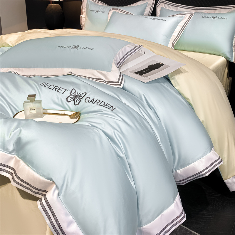 Simple ligero de lujo algodón puro cuatro piezas de sábanas de algodón ropa de cama textil doméstico cuatro estaciones tres piezas de conjunto general