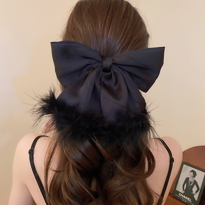 Frau Einfacher Stil Bogenknoten Legierung Tuch Feder Haarklammer display picture 11