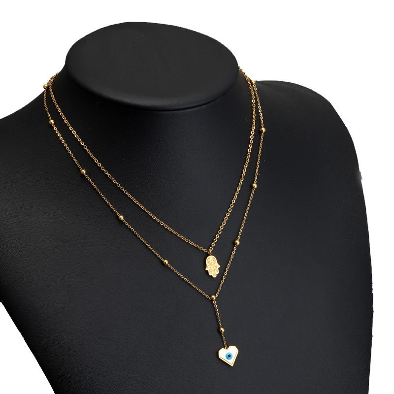 Retro Devilu0027S Eye Palm Heart Shape Titanium Steel Inlaid Shell Necklace