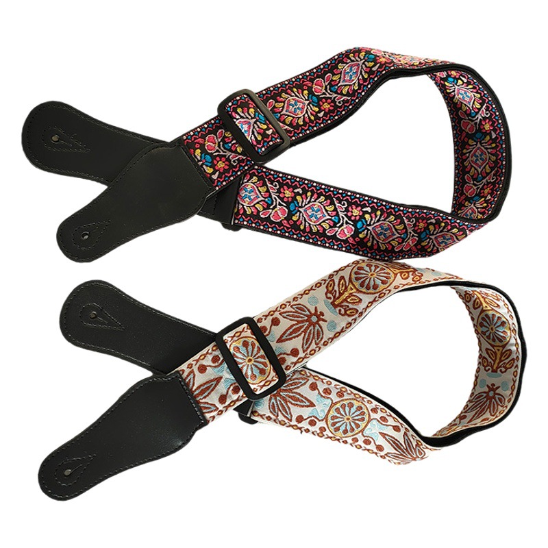 Suministro directo de fábrica de accesorios para instrumentos musicales al por mayor engrosada ensanchada correa para instrumentos musicales estilo étnico Cinta bordada correa de guitarra