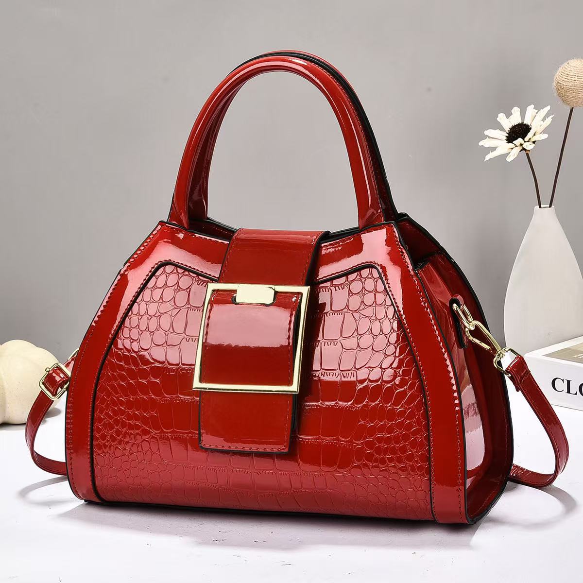 Bolsa de mano de piel brillante de piedra de gran capacidad simple atmósfera mochila de hombro de moda casual bolsas transfronterizas