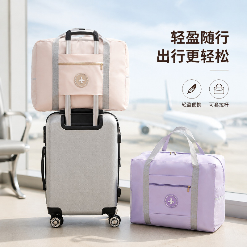 Round logo airplane bag with lining, double-layer travel bag, foldable storage bag, portable clothing storage and organizer bag