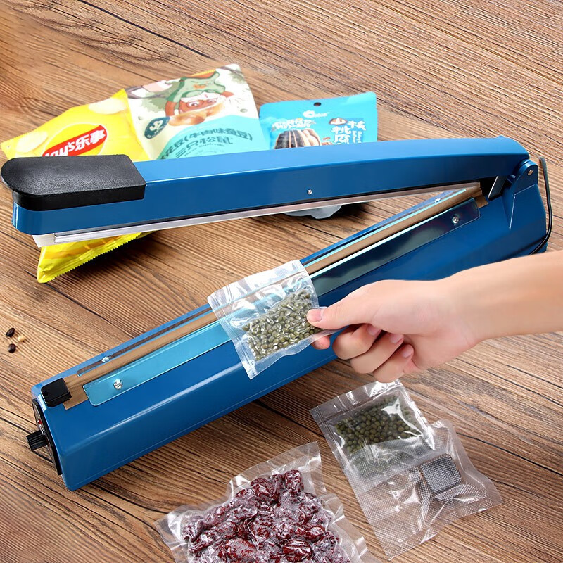 Máquina de sellado de prensa manual, máquina de envasado de bolsas de té, máquina de sellado de plástico manual doméstica, máquina de sellado de prensa en stock image 3