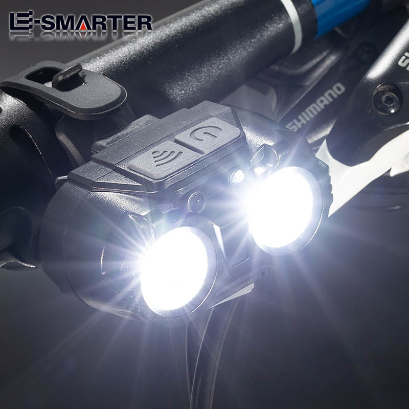Luz transfronteriza de inducción de múltiples fuentes de luz lejos y cerca de doble modo faro de bicicleta nocturna luz de bicicleta al aire libre