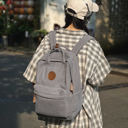 Denim canvas double shoulder bag, vintage style, suitable for students and leisure use.
