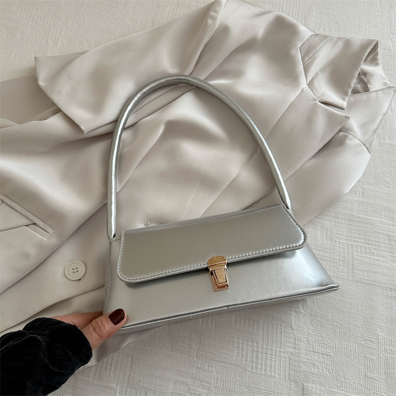 Temperamento simple bolso de hombro de bloqueo de color sólido para mujeres 2024 primavera y verano nuevo nicho de alta calidad bolso de brazo bolso de mujer