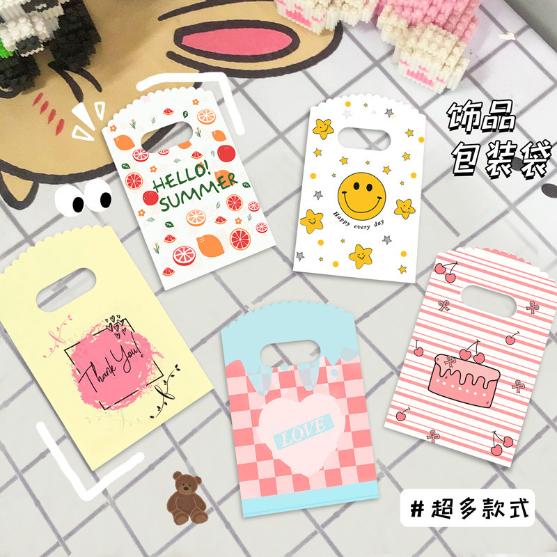 小さいサイズのミニ漫画のビニール袋の逸品のアクセサリーの小さい商品の袋は露店を出して買い物の贈り物の袋の手提げ袋を買います。|undefined