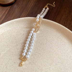 8 pulsera perlas encadenadas doble zircon Saturno