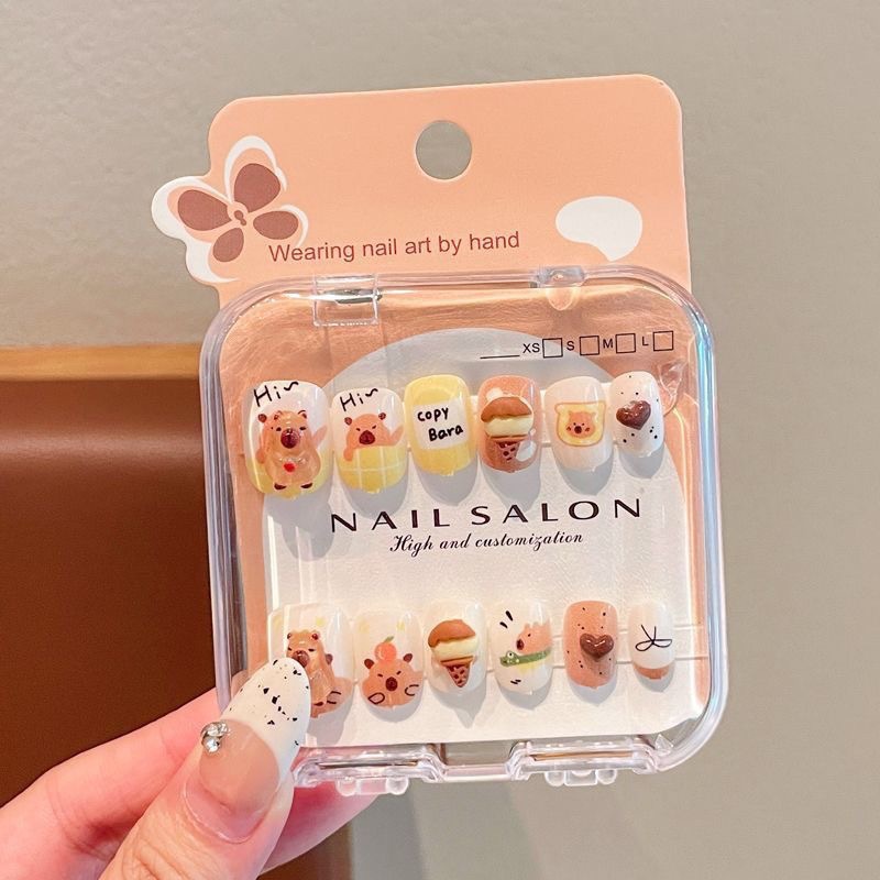 Uñas postizas removibles para niñas, en caja, con diseños de dibujos animados, pegatinas de uñas exquisitas, piezas de uñas.