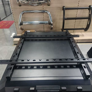 Specialized black metal roof rack for pickup truck bed modification with guardrail protection design