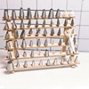 The decorative mouth solid wood storage rack can fold the storage line baking tool to organize the wooden shelf squeezing the flower mouth shelf