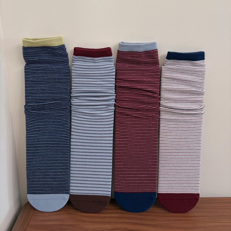 I really like the retro college style! The contrasting color stripes are versatile, and these trendy mid-calf socks are perfect for wearing outside in the fall I really like the retro college style! The contrasting color stripes are versatile, and these trendy mid-calf socks are perfect for wearing outside in the fall