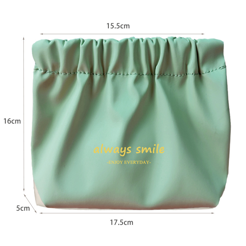 Nuevo impermeable pu bolsa de cosméticos lápiz labial de las mujeres sanitaria servilleta metralla bolsa de almacenamiento portátil cable de datos auriculares bolsa de almacenamiento