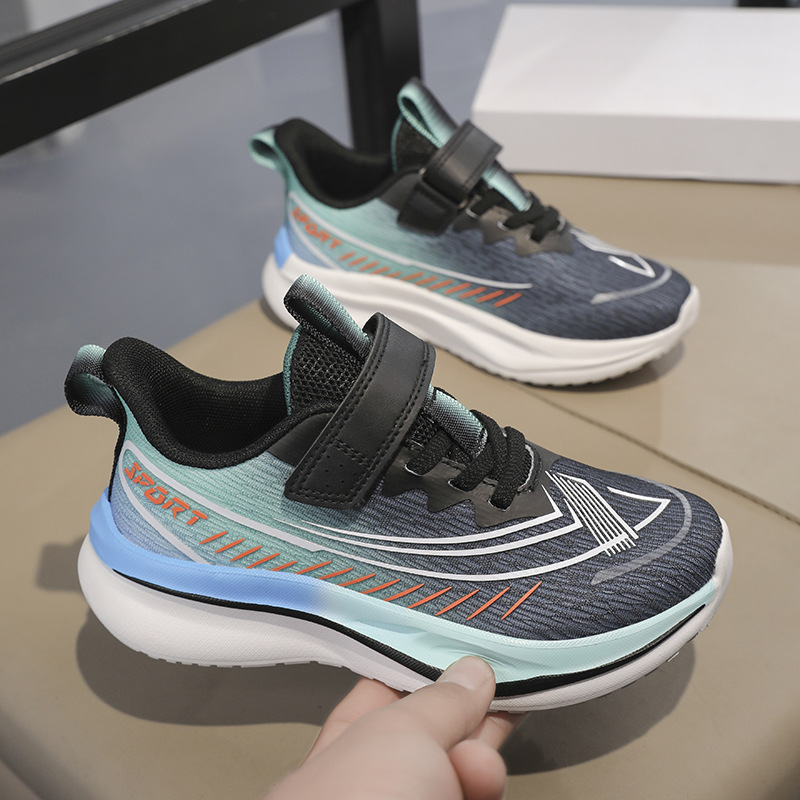 Zapatos de correr de conejo rojo para niños primavera y otoño nuevo tipo de malla transpirable suela suave resistente al desgaste Velcro para niños grandes pasos deportivos antideslizantes