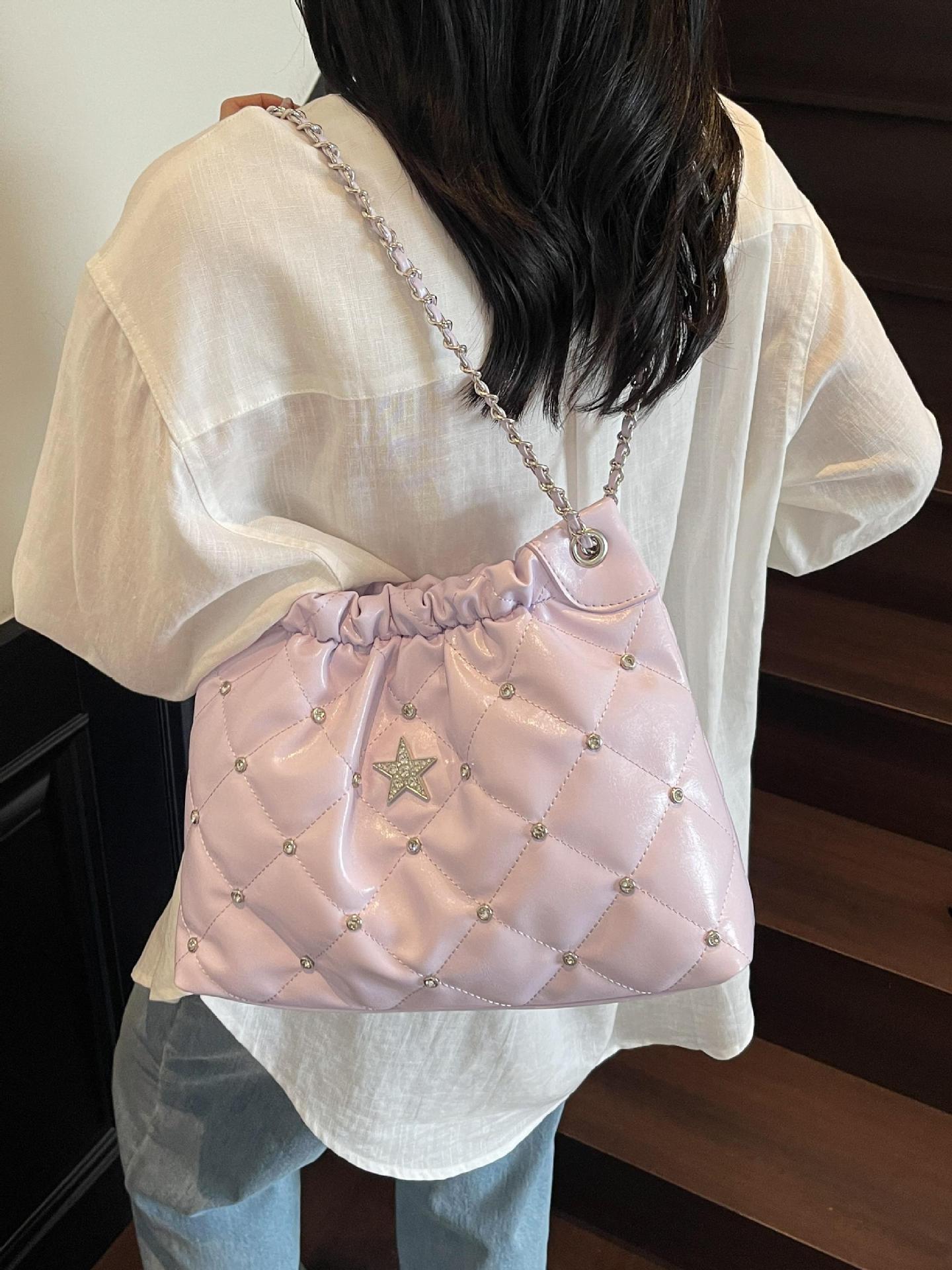 Venta caliente transfronteriza bolso de cubo de cadena de diamantes para mujer 2025 nuevo bolso de hombro casual de todo fósforo bolso de alta capacidad