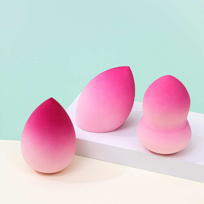 Estilo transfronterizo color degradado maquillaje de huevo soplo de polvo no látex color spray en forma de calabaza maquillaje esponja maquillaje huevo personalizado de fábrica
