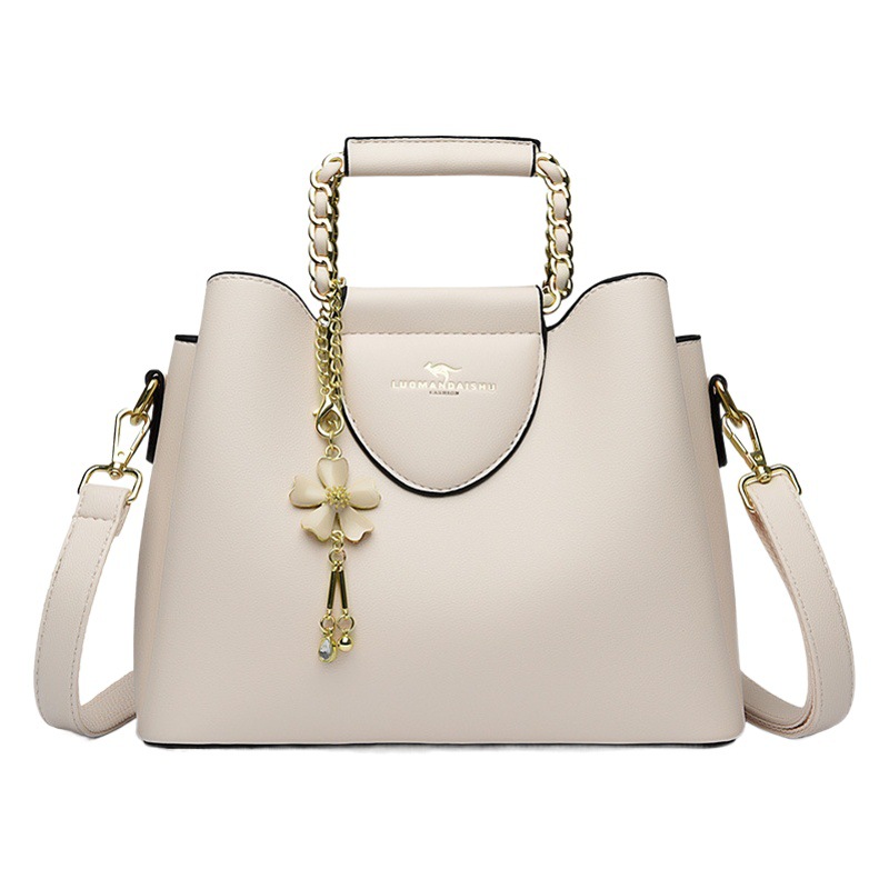 Nueva moda de hombro de las mujeres costura pequeño tamaño exquisito cubo bolsa de gran capacidad de cuero suave de una sola pieza de entrega para mamá más joven