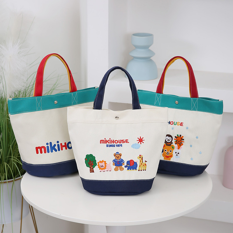 Bolso de mamá Bolso de dibujos animados zoológico para mujer Bolso de almacenamiento de gran capacidad Bolso de cubo portátil con estampado bordado simple