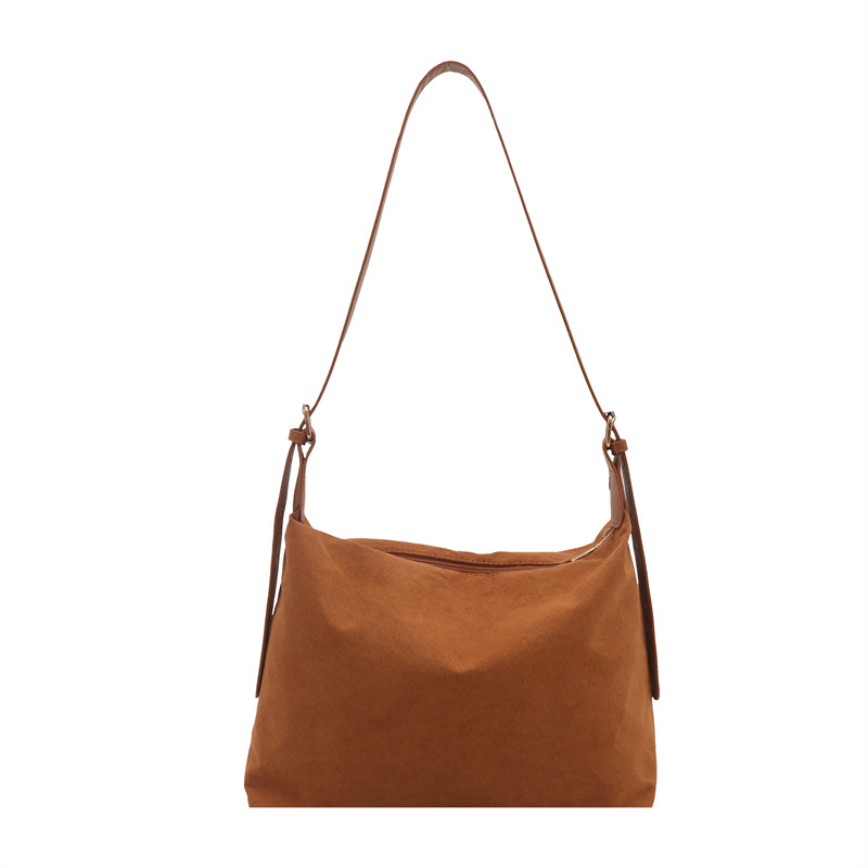 2025 primavera europea y americana estilo retro gaudón estilo de diseño de gran capacidad de viaje temperamento simple bolsas de hombro para mujeres
