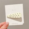 2# beige black polka dot hair clip