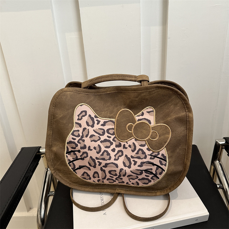 Honey Kitty Leopard empalme imitación jeans colorido simple multifuncional gran capacidad de un hombro mochila 2024 bolso de mujer