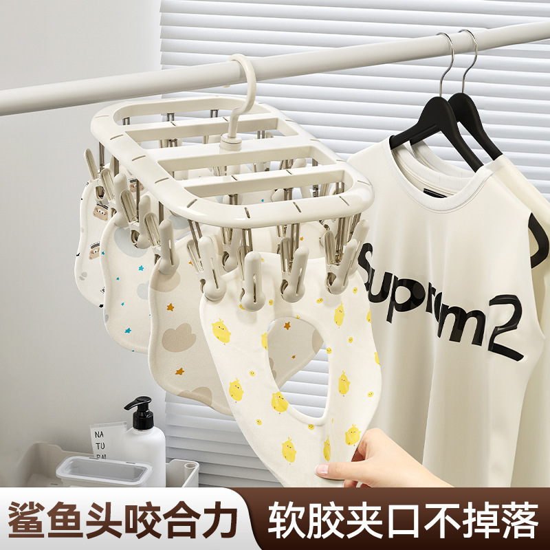 靴下のハンガー家庭用ベランダには多くのクリップが付いています。|undefined