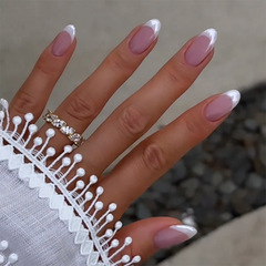 Xiao Hong style nail art, wholesale cross-border exclusive fake nails with white edge nail art pieces.