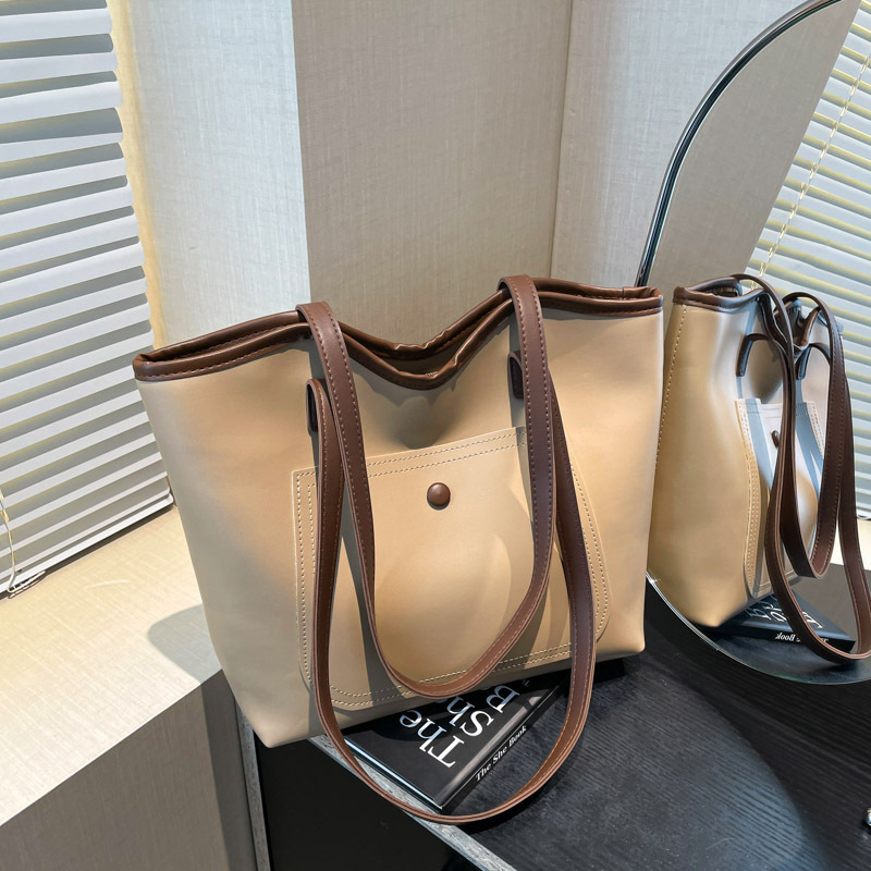 Bolsa de gran capacidad para mujeres 2025, nueva bolsa de hombro simple, sensación de relajación, bolsa de brazo, bolso de viaje, bolso de empalme de color