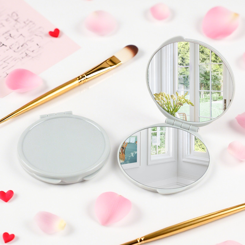 Nuevo espejo redondo pequeño, mini espejo plegable con logo impreso, espejo de doble cara, espejo portátil de alta definición, espejo pequeño al por mayor