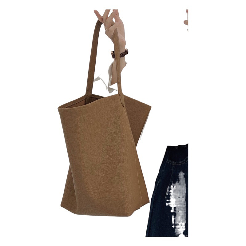 牛革トートバッグ女性のための 2025 新しいシングルショルダー大容量ショッピングバッグカジュアル怠惰なスタイル脇の下バッグ通勤バッグ