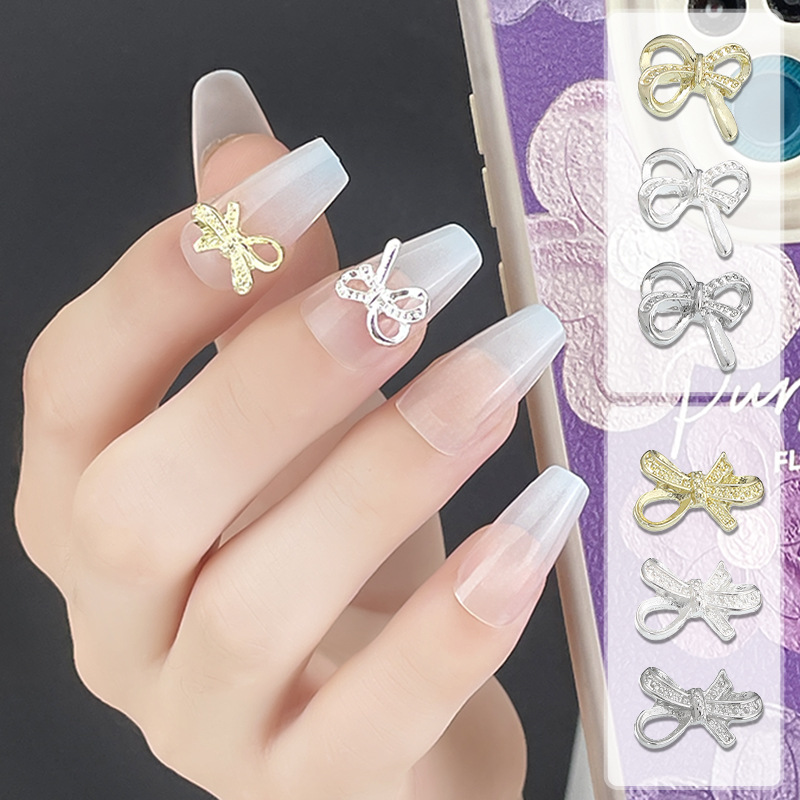 Nueva joyería de uñas, lazo, pajarita de lujo ligero, accesorios de uñas de aleación, accesorios de diamantes de uñas de celebridades de Internet tridimensionales, estilo caliente