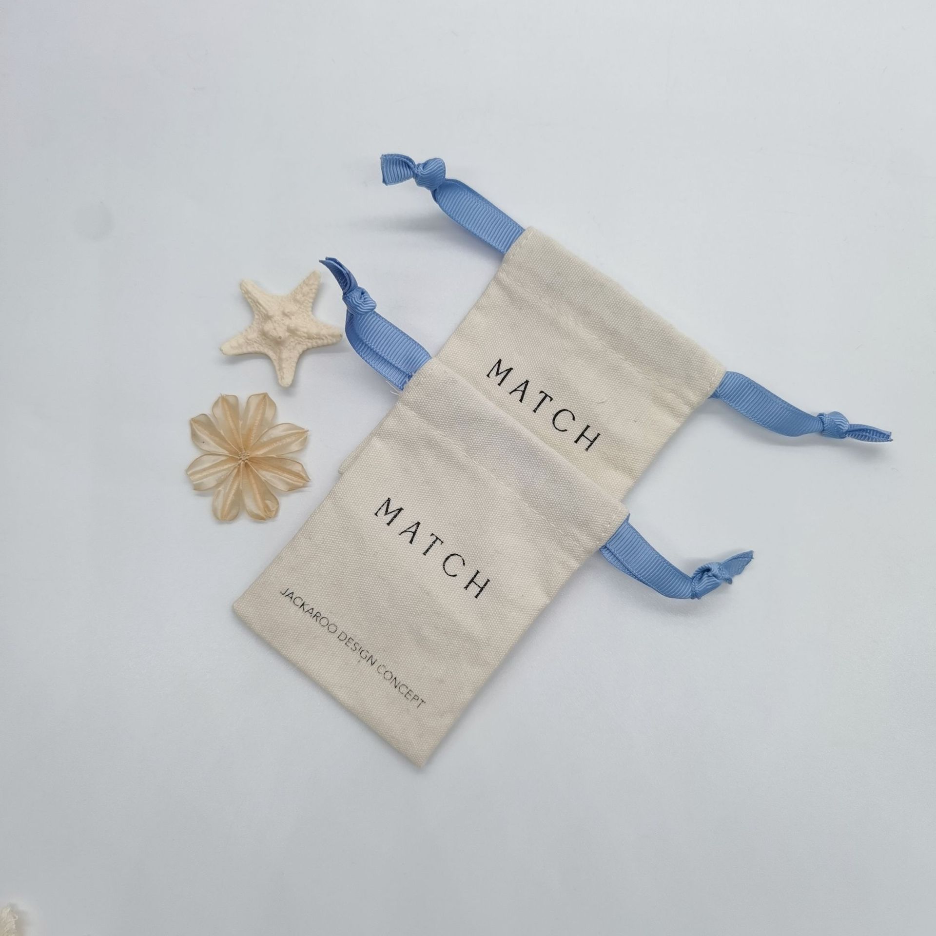 工厂大量双抽绳帆布收纳钥匙卡片手链饰品卡片包装袋免费打样logo