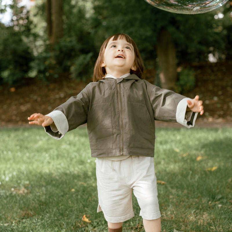 INS Estilo nórdico primavera y otoño abrigo puro algodón liso ropa para niños masculino y femenino bebé con capucha Outwear a prueba de viento caliente al por mayor