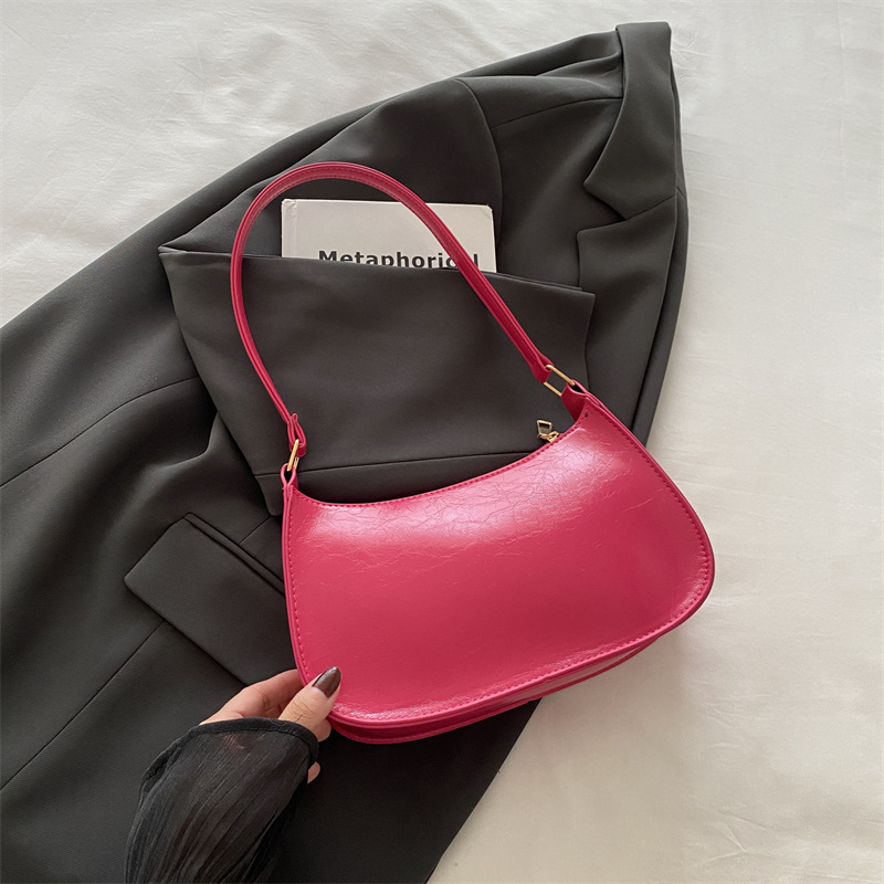 Bolso de sentido de alta gama para mujer 2024 nuevo bolso de palo francés bolso retro portátil para axilas bolso de charol de un solo hombro para niña de estilo occidental