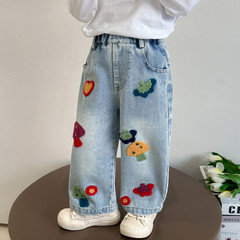女の子のデニムのストレートパンツ2025春の服の新型の洋風の流行の子供のゆったりしている韓国版のアニメの刺繍の広い足のズボン