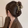 Crab pin with bow
