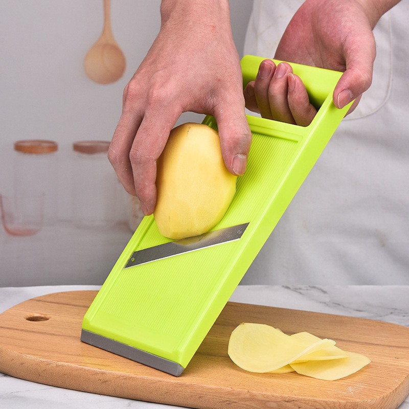 El nuevo cortador de verduras multifuncional tiene un cortador de seda de mano, un cortador de rábano, un cortador de patatas, un pepino y una cocina doméstica. image 4