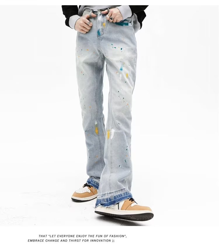 Jeans uomo slim fit stretch con strappi e taglio micro flare_voghion.com