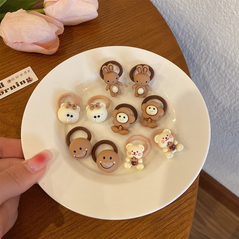 Accesorios para el cabello para niños cuerda para la cabeza linda verano nueva banda de goma pequeña lazo para el cabello del bebé menos volumen de cabello lazo para el pulgar cuerda para el cabello al por mayor