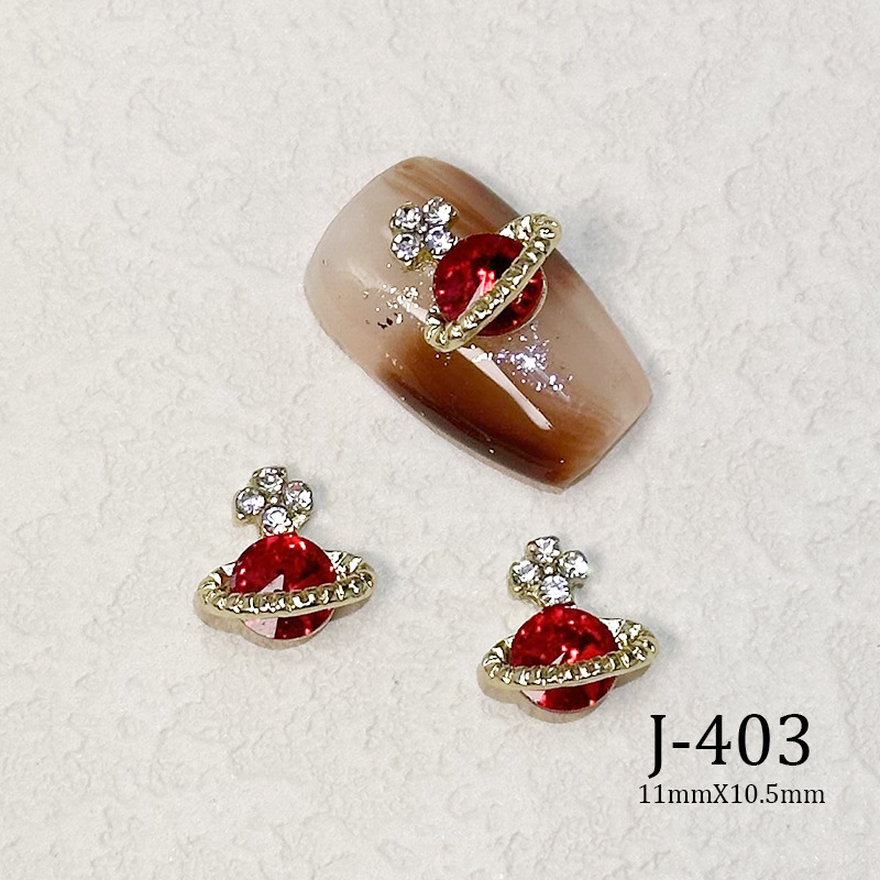 2023 Nueva joyería de uñas Año nuevo rojo aleación conejo rojo mariposa de cristal pintura en aerosol arco accesorios de diamantes de uñas