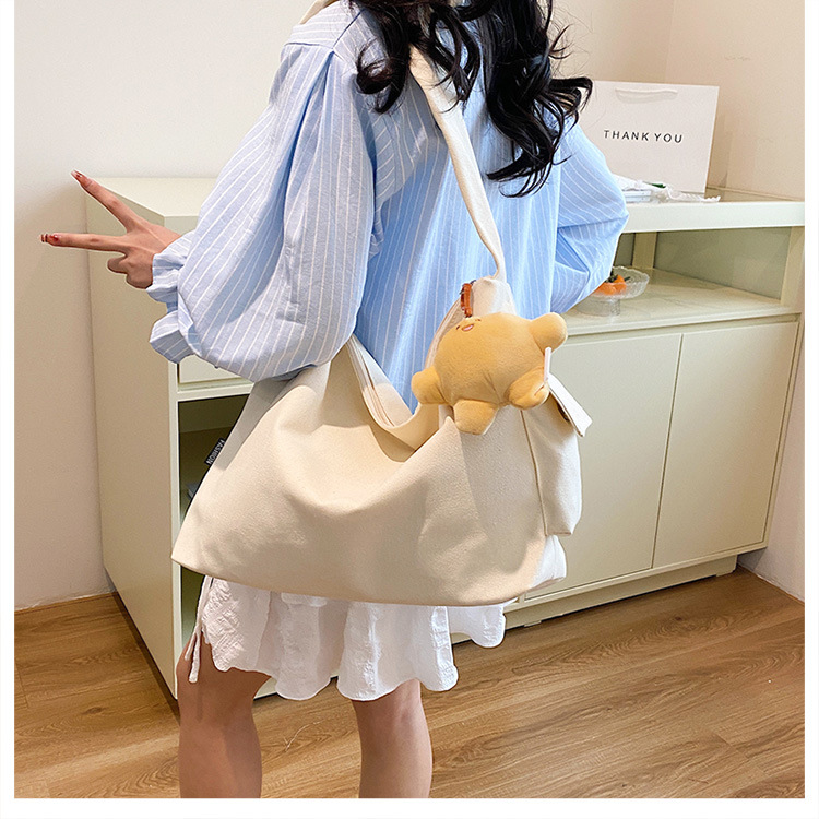 The 2024 new Korean-style simple and laid-back casual canvas crossbody bag and the large-capacity versatile tote bag are selling well undefined
