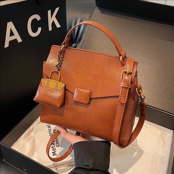 Bolso retro transfronterizo de alto nivel bolso cuadrado para mujeres otoño y invierno 2025 nuevo tipo de mochila casual simple bolso de hombro