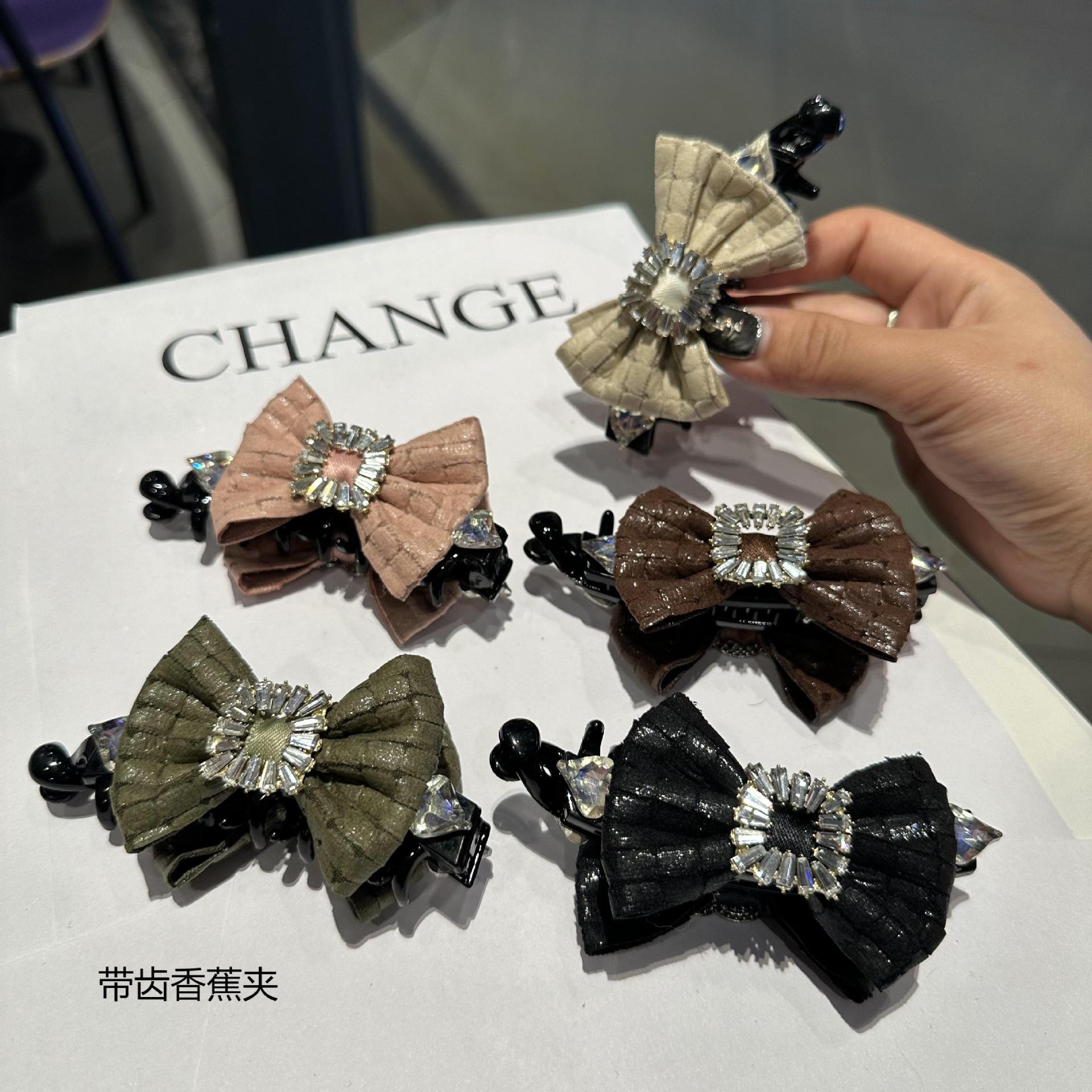 韓版皮質蝴蝶結抓夾網紅後腦勺盤發鯊魚夾香蕉夾半抓夾氣質爪髮飾