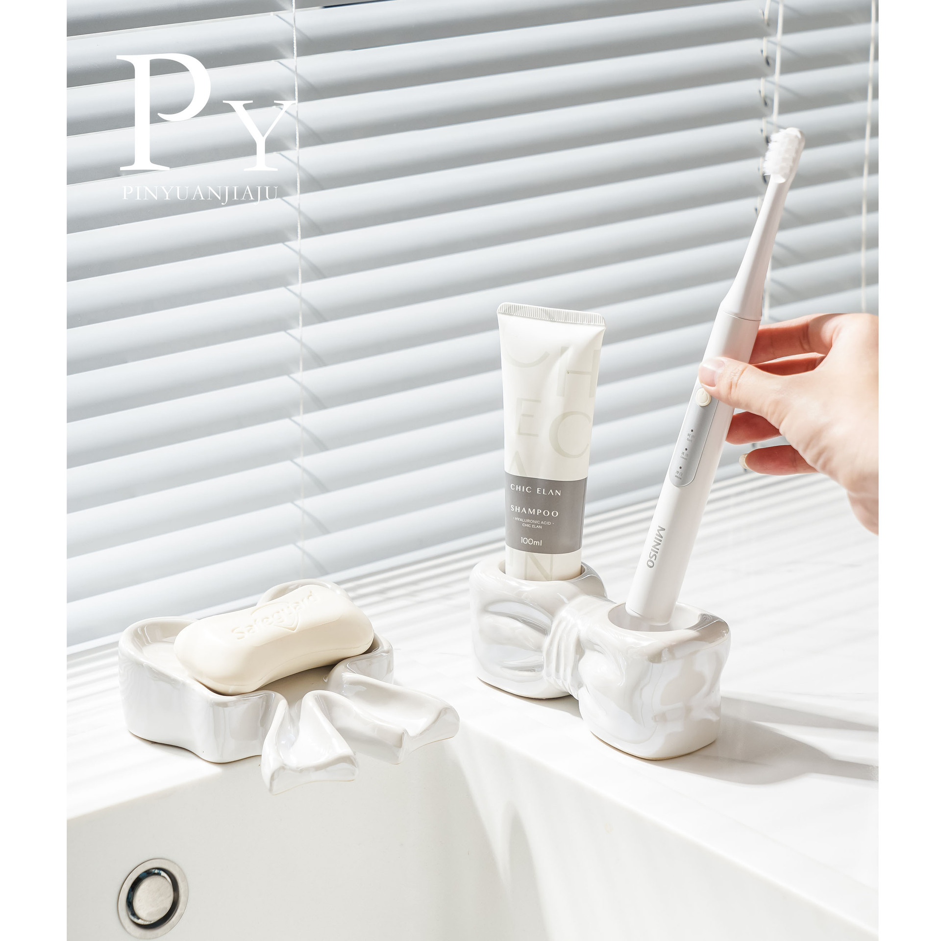 Jabonera de cerámica en forma de arco con drenaje para lavabo de baño, creativa, de alta gama, ligera y lujosa, soporte para jabón transfronterizo.