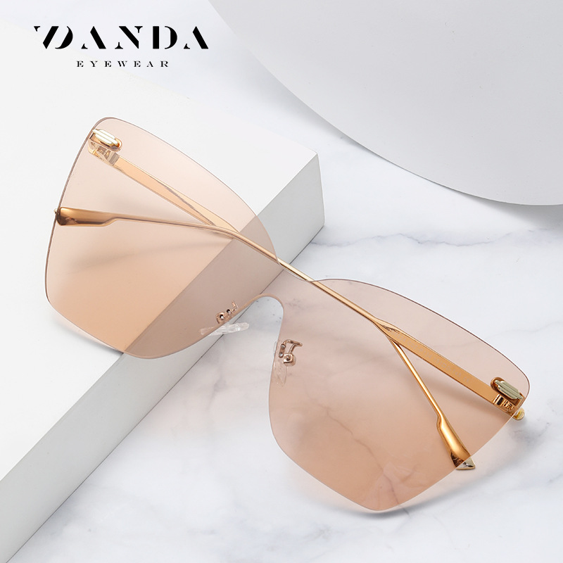 Nuevas gafas de sol JS8524 moda europea y americana de una sola pieza sin marco gafas de sol UV a prueba de hombres y mujeres mismas gafas de sol